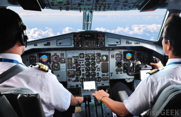 pilots-sit-behind-older-cockpit.jpg