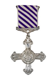 Britský Záslužný letecký kříž - DFC. Udělení bylo schváleno v říjnu 1943, Smikova dekorace proběhla v lednu 1944.