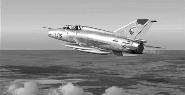 MiG-21UM za letu. Tento stroj při dělení republiky připadl Slovensku. 